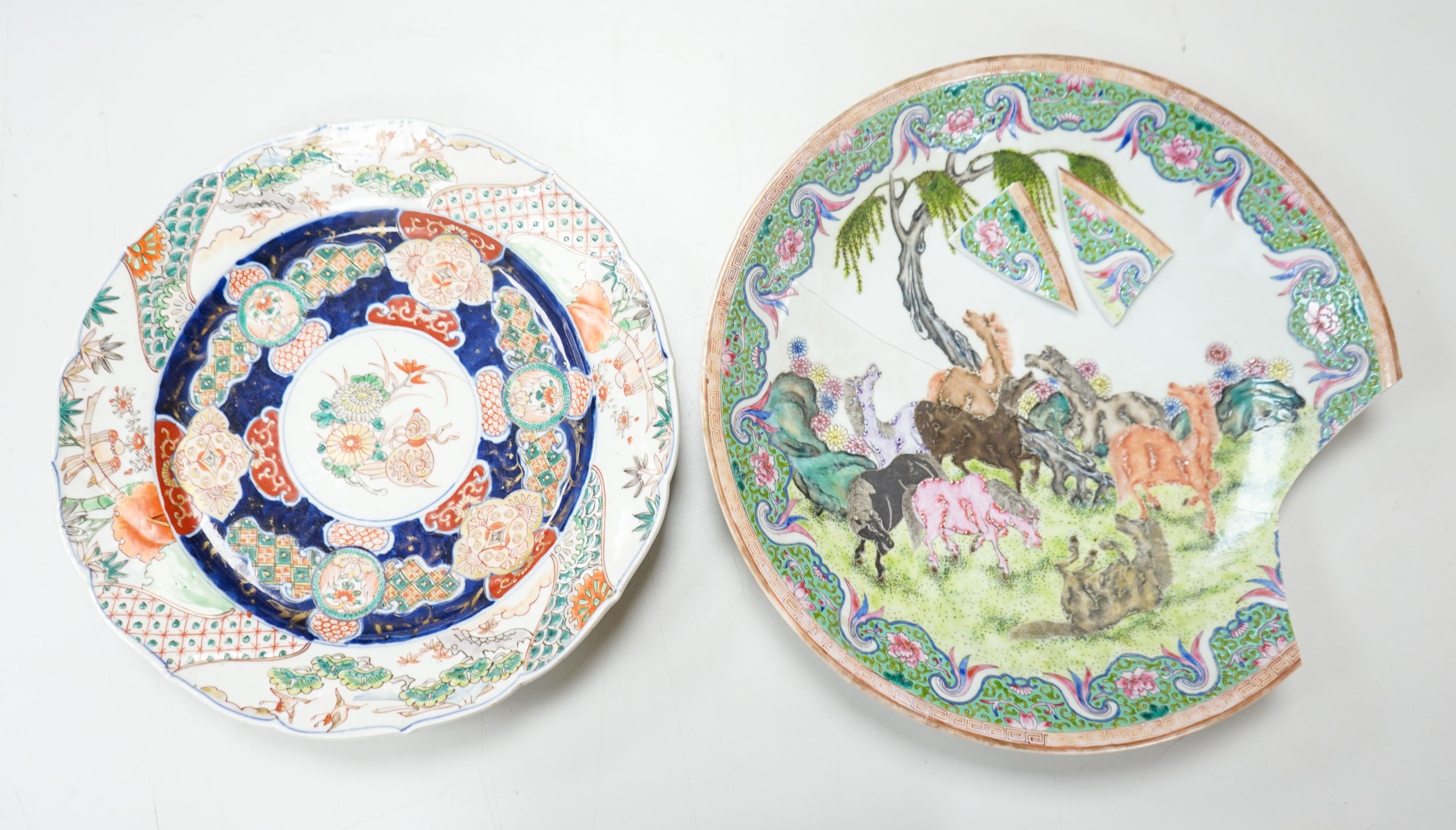 A 19th century Japanese Imari dish, 30cm and a damaged Chinese famille rose dish, 33.5cm 34cm